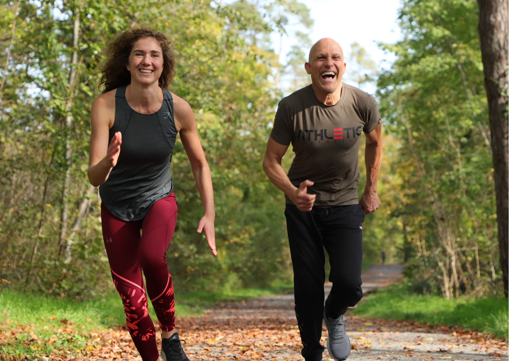 Personal Trainer Bernd Wolfgang mit Klientin beim Joggen